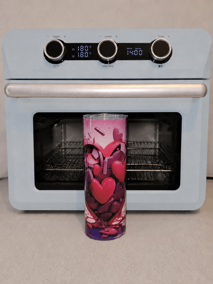Tumbler personnalisé devant la presse à sublimation de l'atelier SublimationStore, fabriqué en France dans l'Oise