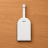 Étiquette bagage personnalisée recto vierge avant impression – simili cuir blanc forme arc – zone impression 7x11cm
