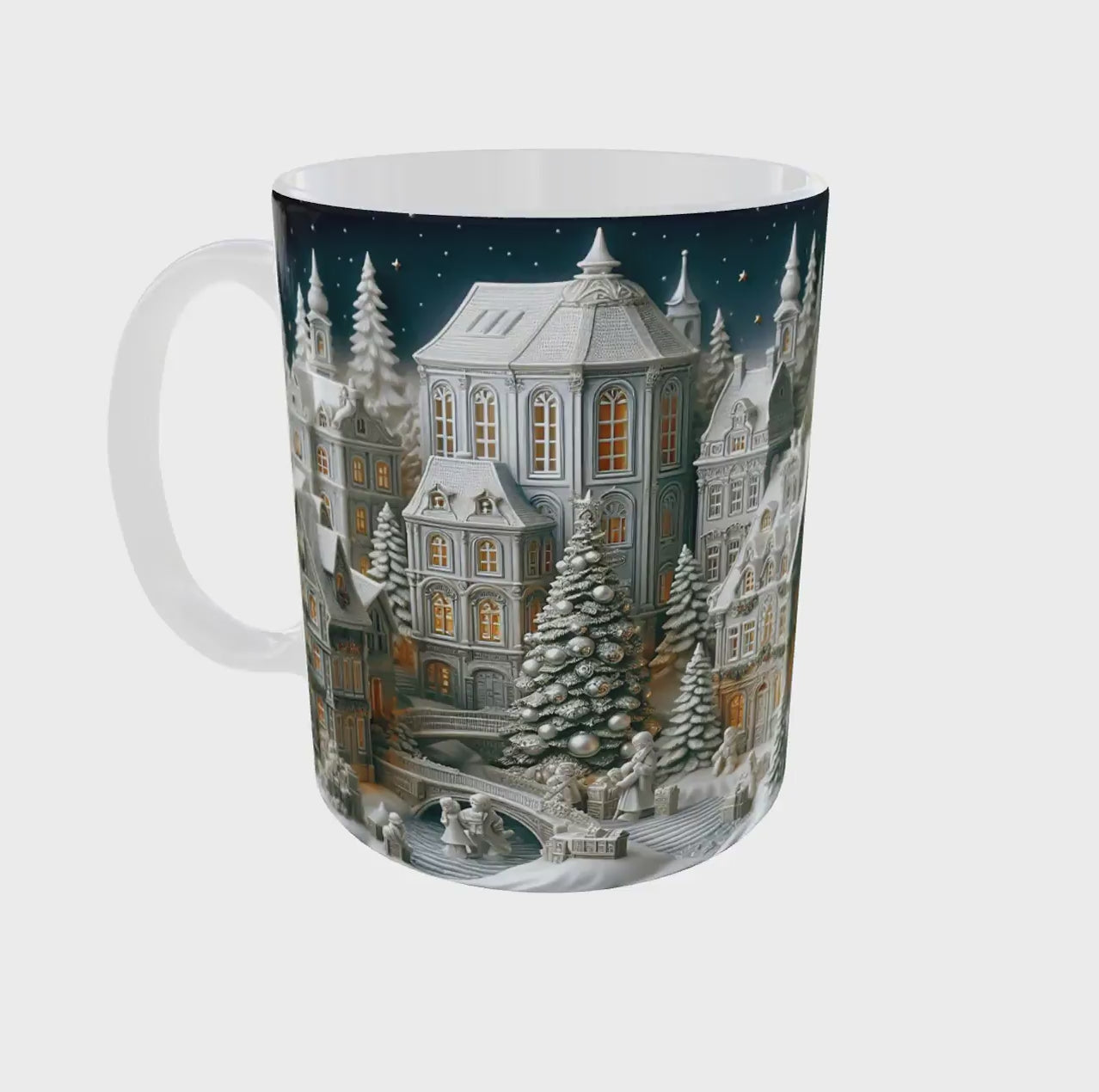 Vidéo 360° du mug de Noël village enneigé avec maisons de porcelaine en relief imprimées sur tout le tour