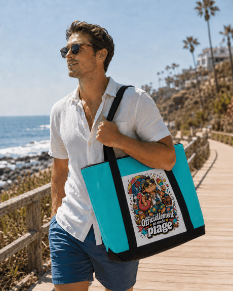 Homme portant le tote bag sac de plage vert aqua cartoon beach boss en bandoulière bord de mer