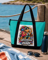 Tote bag sac de plage vert aqua design beach boss posé sur ponton en bois vue mer