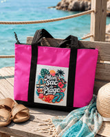 Tote bag Mon Sac de Plage rose posé sur un ponton en bois face à la mer